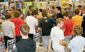 Duty calls: Gamers pack into GAME in Grafton Shoppingworld at midnight last night to get the latest instalment in the Call of Duty franchise, Black Ops. Duty calls: Gamers pack into GAME in Grafton Shoppingworld at midnight last night to get the latest instalment in the Call of Duty franchise, Black Ops.